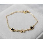 Black enamel heart bracelet